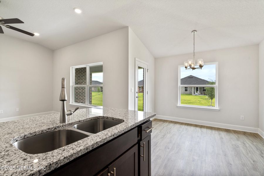 Furnished interior view inside a new home in Shadow Crest at Rolling Hills, Green Cove Springs (Image 3).
