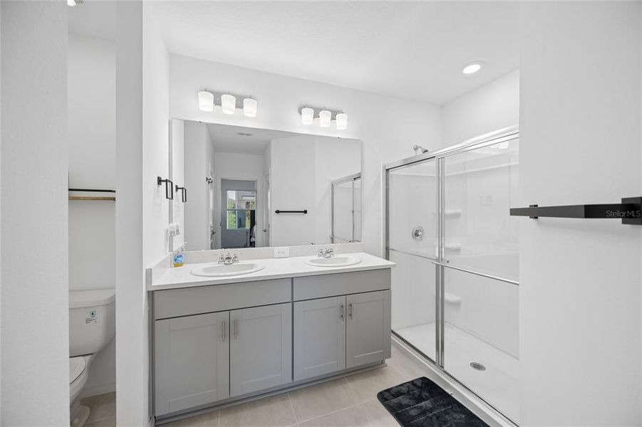 Furnished interior view inside a new home in Westview Community Group Page, Kissimmee (Image 23).