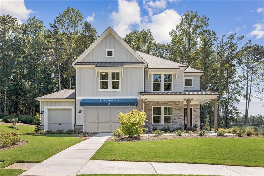 Front exterior of a new home in Ashbury Commons, Powder Springs, GA, highlighting curb appeal (Image 1). Front exterior of a new home in Ashbury Commons, Powder Springs, GA, highlighting curb appeal (Image 1).