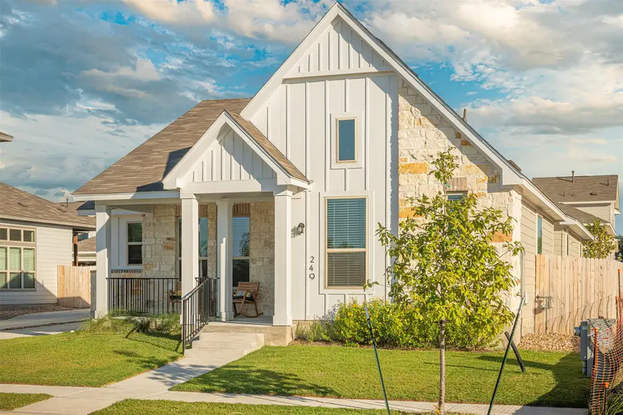Front exterior of a new home in Sage Hollow, Kyle, TX, highlighting curb appeal (Image 20).