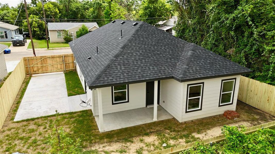 Back of house with a patio area