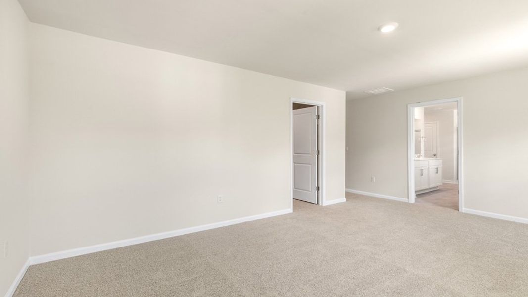 Spacious, unfurnished interior of a new home in Villa Grande, Winterville (Image 37).