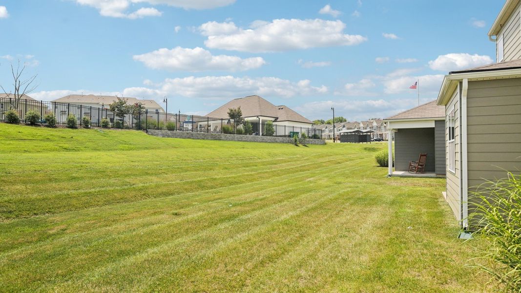 Exterior details and patio area of a home in The Parks, White House (Image 26).