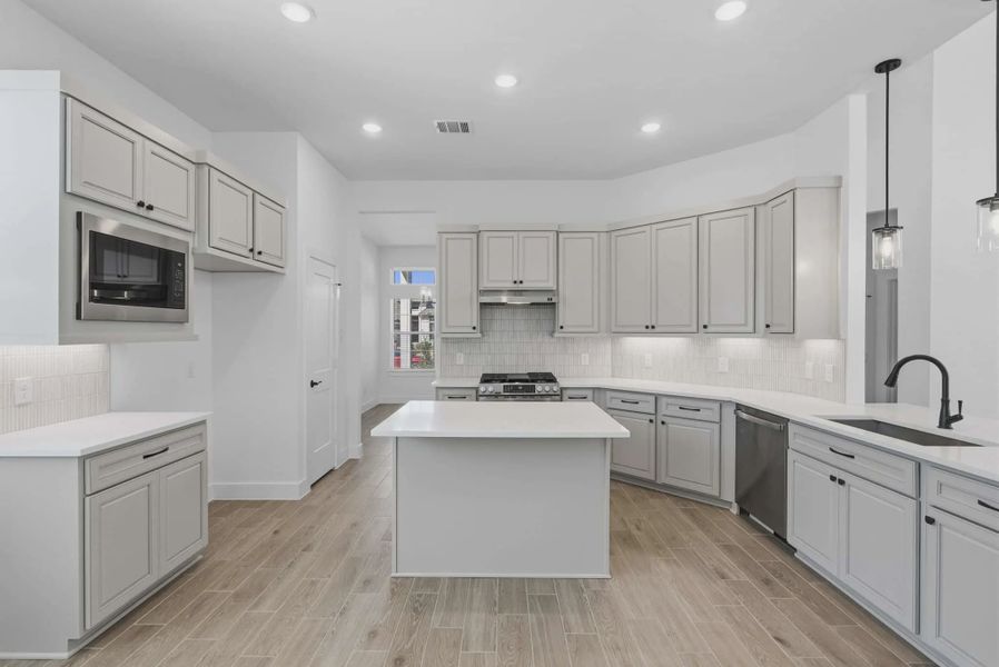 Representative furnished interior of a home built from the Emma by Chesmar Homes in Bridgeland, Elgin (Image 5).