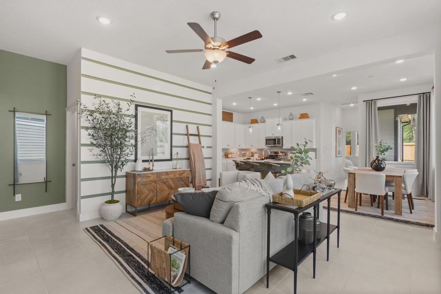 Representative furnished interior of a home built from the Versailles by Chesmar Homes in The Woodland Hills Chateau, Willis (Image 5).
