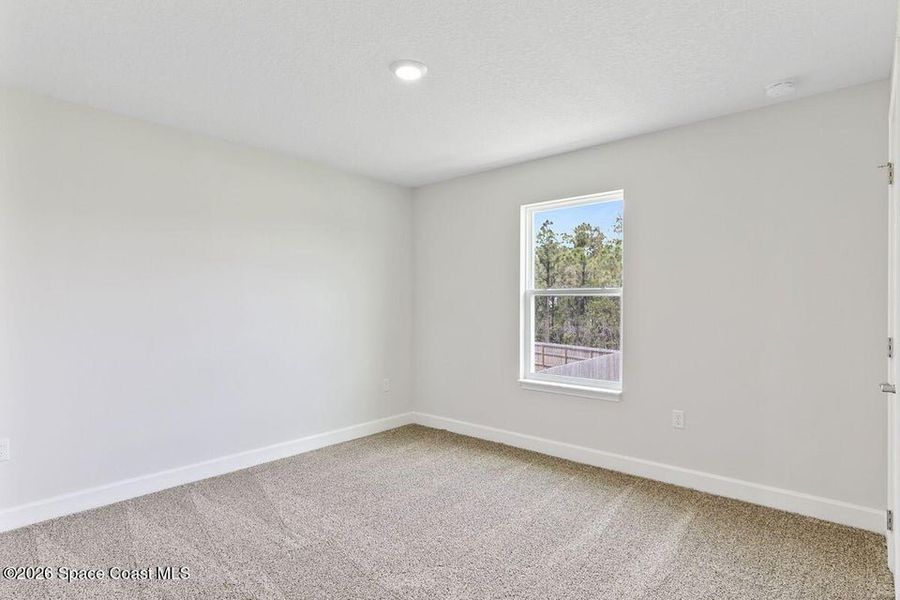 Spacious, unfurnished interior of a new home in St. John's Preserve, Palm Bay (Image 17).