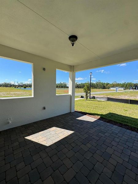 Exterior details and patio area of a home in Ridgehaven, Ormond Beach (Image 3).