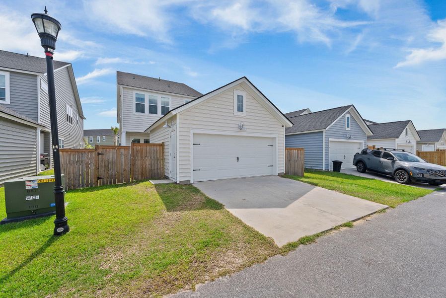 Front exterior of a new home in Heron's Walk at Summers Corner, Summerville, SC, highlighting curb appeal (Image 26).