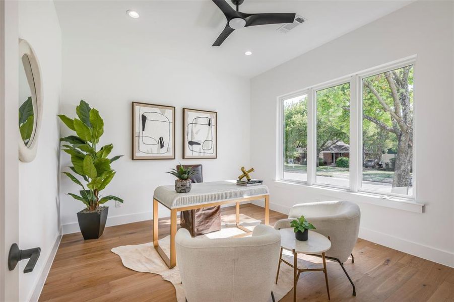 Office space with light wood-type flooring, recessed lighting, and ceiling fan Office space with light wood-type flooring, recessed lighting, and ceiling fan