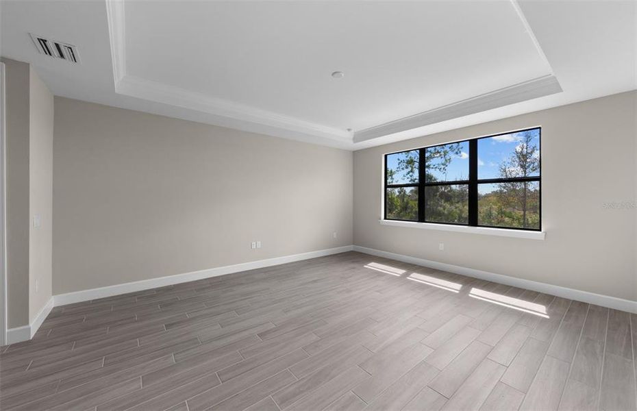 Spacious, unfurnished interior of a new home in Arbor Oaks, North Port (Image 10).