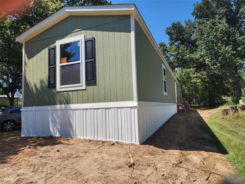 Exterior details and patio area of a home in , Gun Barrel City (Image 19).