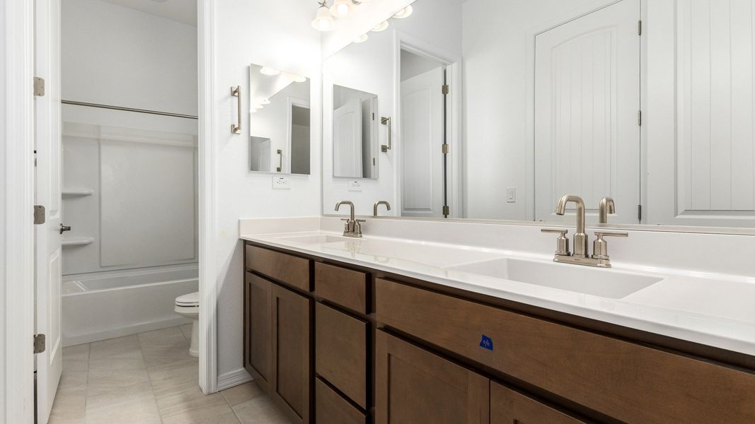 Furnished interior view inside a new home in Arroyo Seco - Hacienda, Buckeye (Image 19).