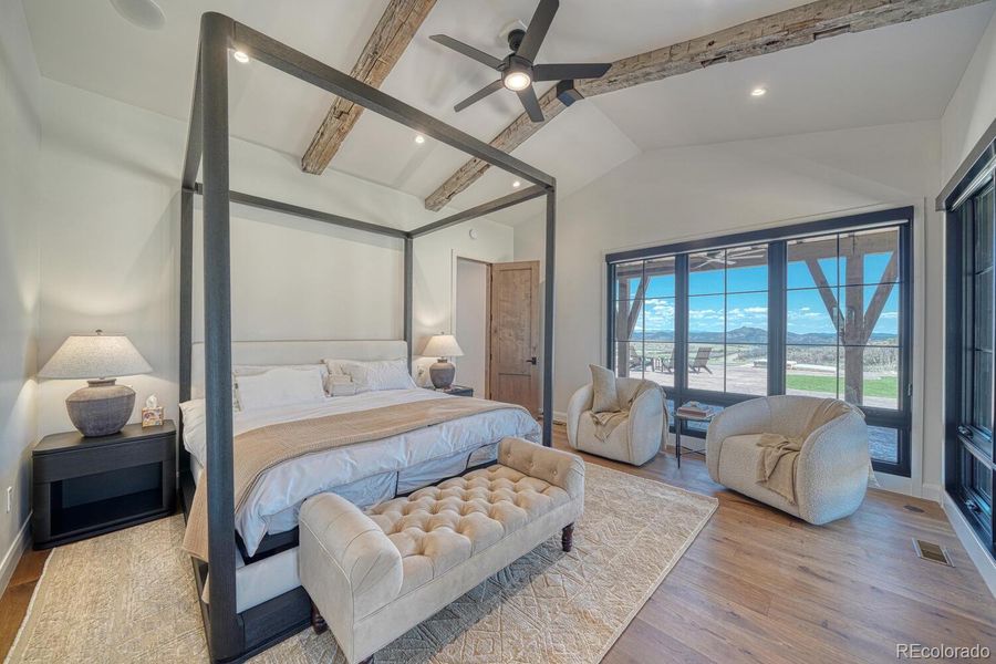 Glass doors lead directly to a secluded patio with unobstructed mountain views. Glass doors lead directly to a secluded patio with unobstructed mountain views.