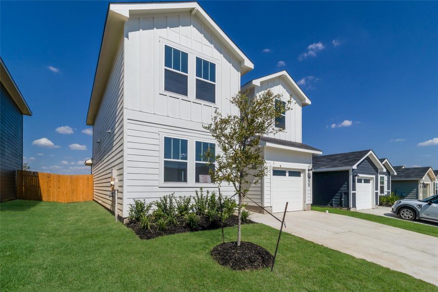 Front exterior of a new home in Marigold, Uhland, TX, highlighting curb appeal (Image 16). Front exterior of a new home in Marigold, Uhland, TX, highlighting curb appeal (Image 16).