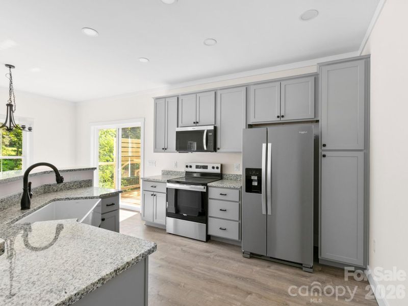 Furnished interior view inside a new home in , Candler (Image 4).