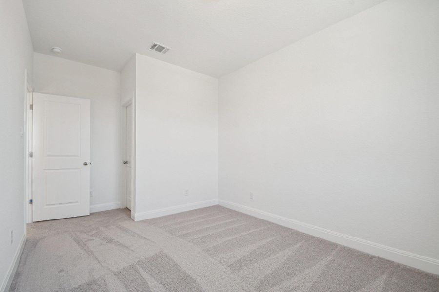 Spacious, unfurnished interior of a new home in 6 Creeks, Kyle (Image 23).
