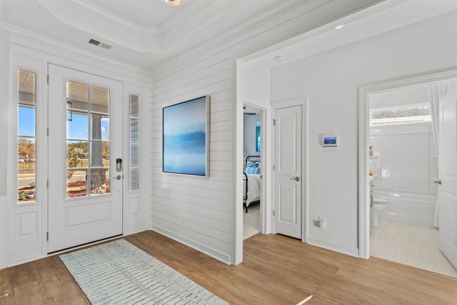 Representative furnished interior of a home built from the The Longboard by Chesapeake Homes in Coastal Club of the Carolinas, Calabash (Image 6).