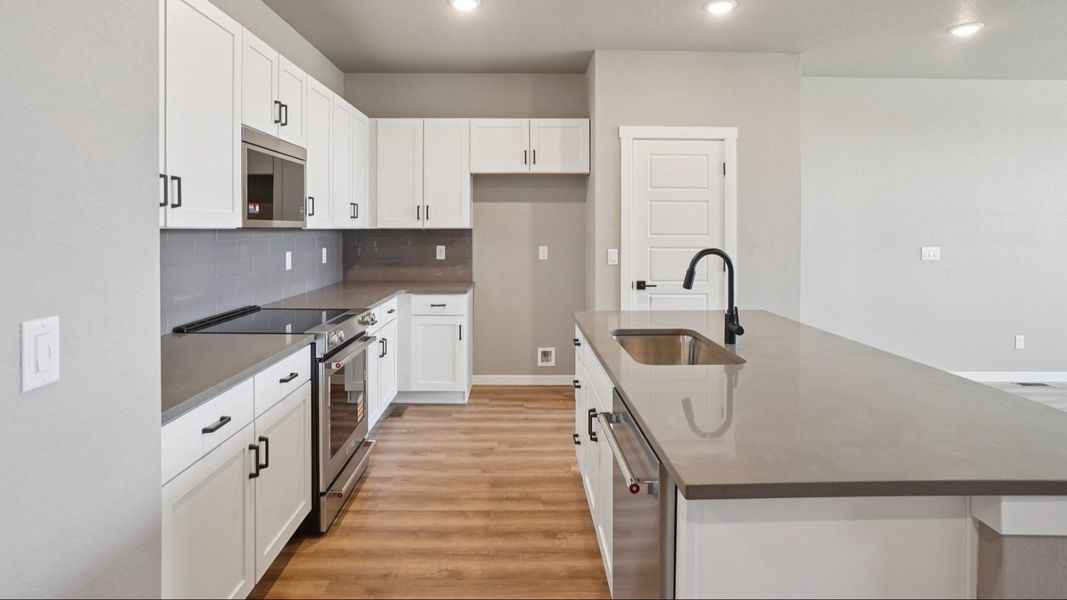 Furnished interior view inside a new home in Windler Townhomes, Aurora (Image 18).
