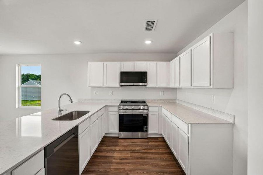 Furnished interior view inside a new home in Urban's Place, Chatsworth (Image 6).