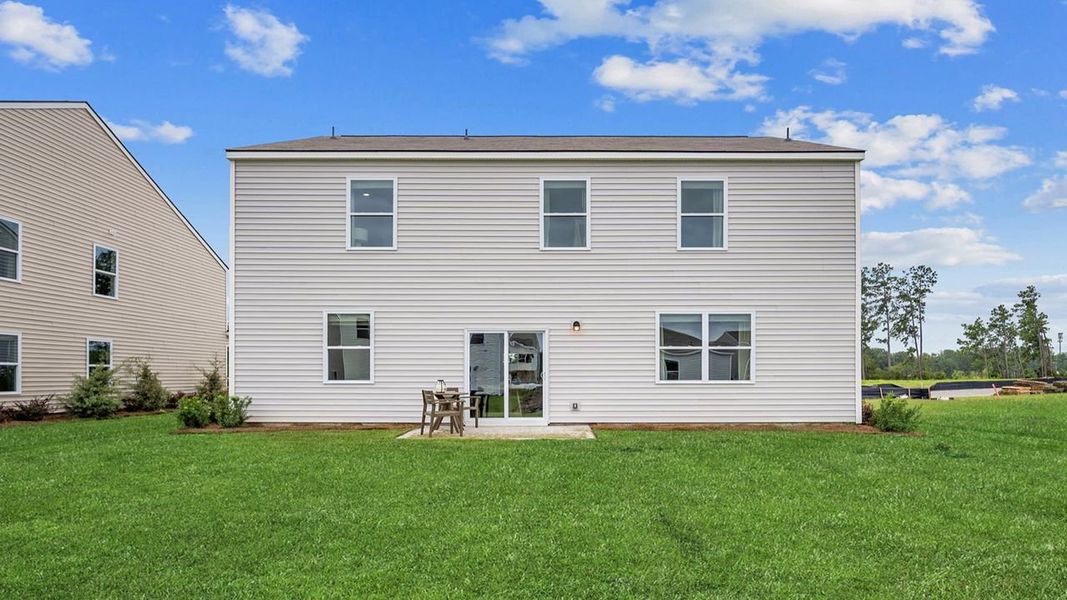 Front exterior of a new home in Cobblestone Village, Savannah, GA, highlighting curb appeal (Image 2).