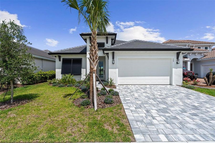 Front exterior of a new home in , Palm Coast, FL, highlighting curb appeal (Image 29).