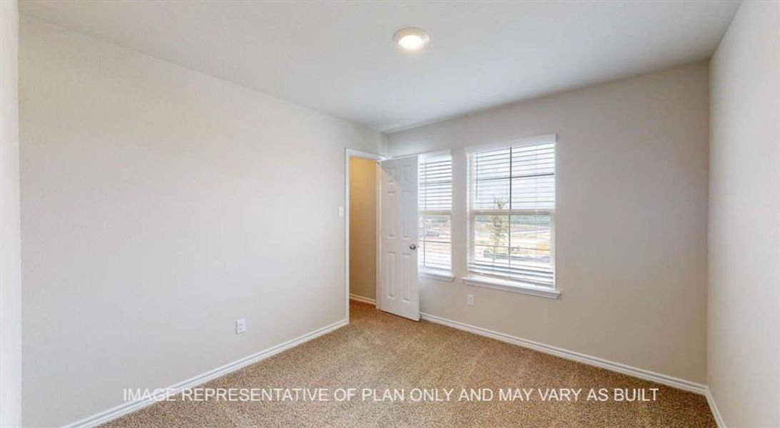 Unfurnished bedroom featuring carpet floors and a closet Unfurnished bedroom featuring carpet floors and a closet