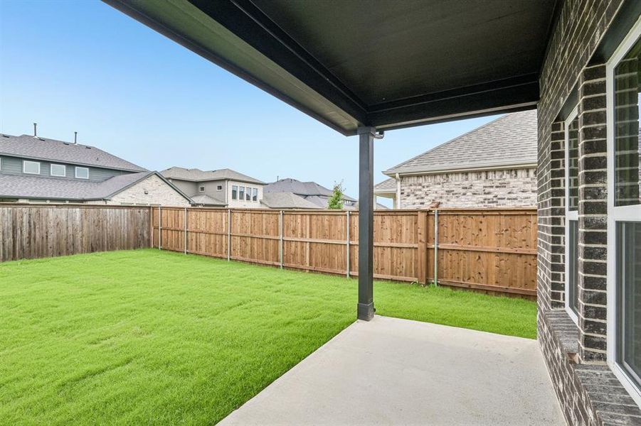 Exterior details and patio area of a home in Overland Grove, Forney (Image 18).