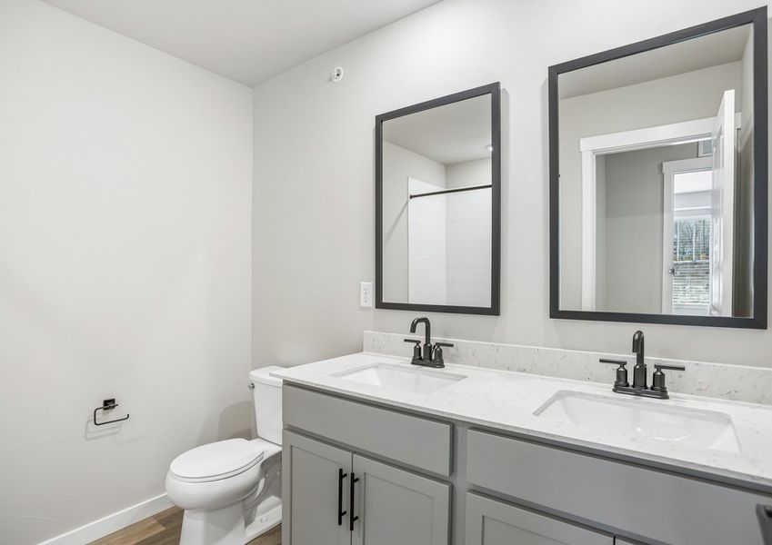 The secondary bathroom has a tub/shower combo.