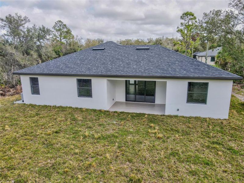 Exterior details and patio area of a home in , Port Charlotte (Image 3).