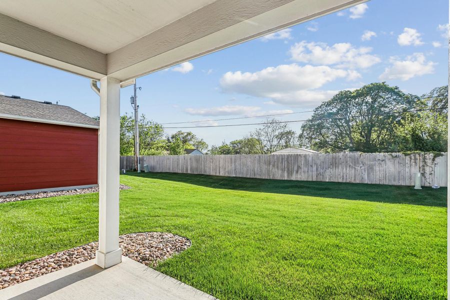 Exterior details and patio area of a home in Heritage Commons, Andover (Image 3).