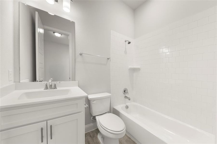 Furnished interior view inside a new home in Painted Tree Showcase, McKinney (Image 10).