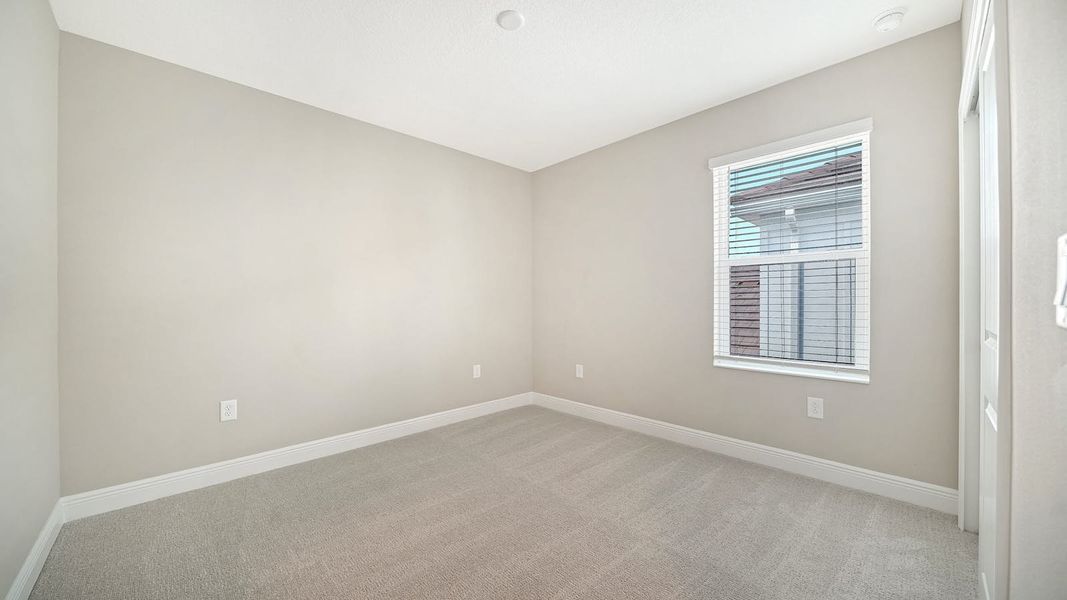 Spacious, unfurnished interior of a new home in Windward Real Estate and Homes for Sale in Sarasota, FL - Neal Communities, Lakewood Ranch (Image 44).