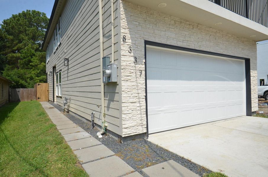Front exterior of a new home in , Houston, TX, highlighting curb appeal (Image 23). Front exterior of a new home in , Houston, TX, highlighting curb appeal (Image 23).