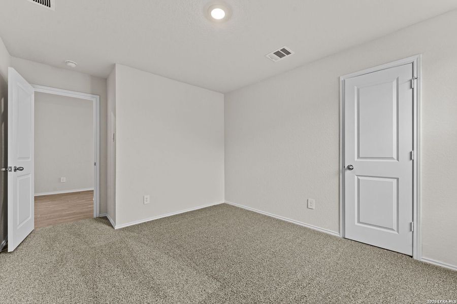 Spacious, unfurnished interior of a new home in Navarro Fields, Seguin (Image 21).