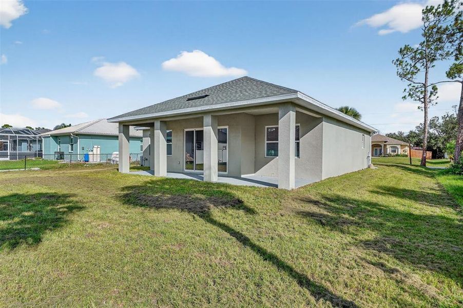 Exterior details and patio area of a home in , North Port (Image 2).