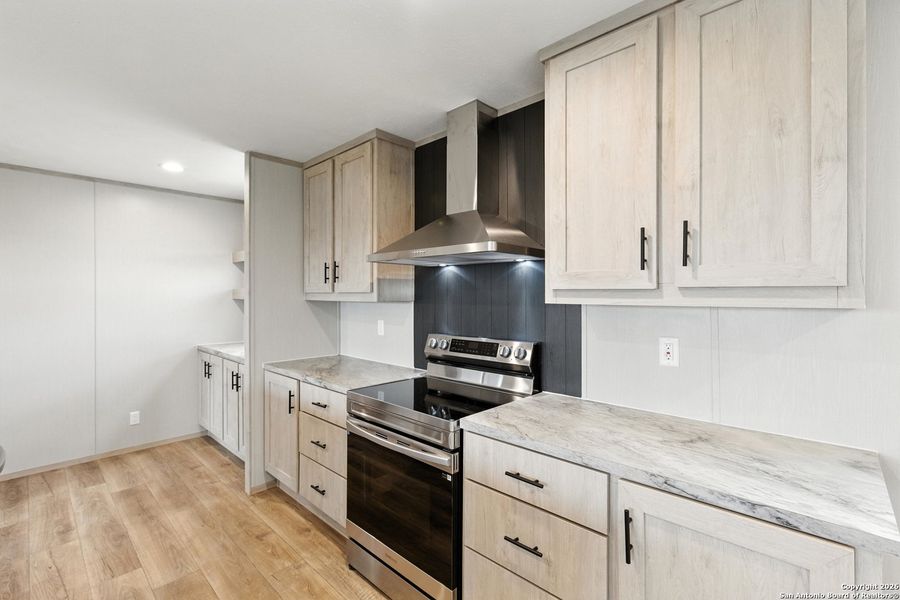 Furnished interior view inside a new home in , La Vernia (Image 10).