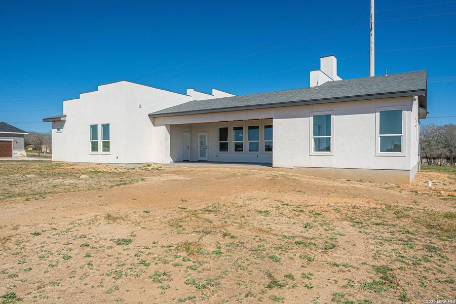 Exterior details and patio area of a home in , La Vernia (Image 24).