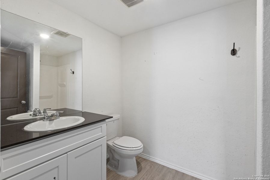 Furnished interior view inside a new home in Elm Trails, San Antonio (Image 7).