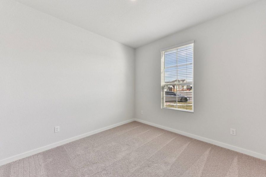 Spacious, unfurnished interior of a new home in Stallion Run, Buda (Image 14).