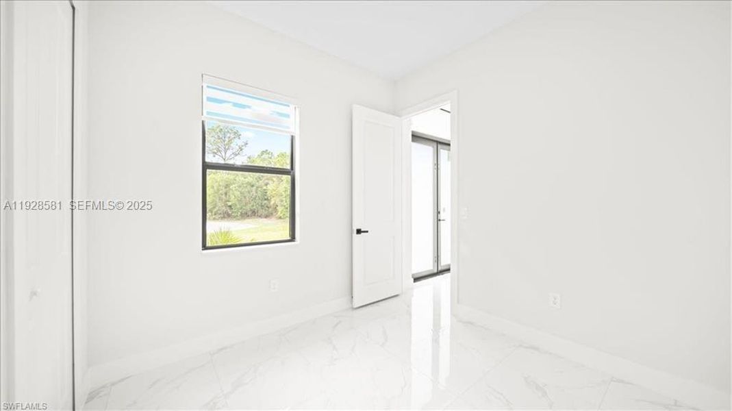 Spacious, unfurnished interior of a new home in , Lehigh Acres (Image 25).
