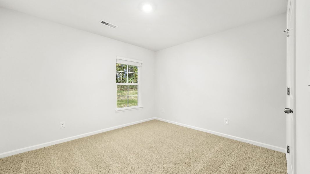 Spacious, unfurnished interior of a new home in Greystone North, Stoneville (Image 11).