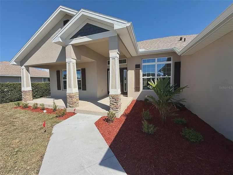 Exterior details and patio area of a home in Rotonda, Rotonda West (Image 3).