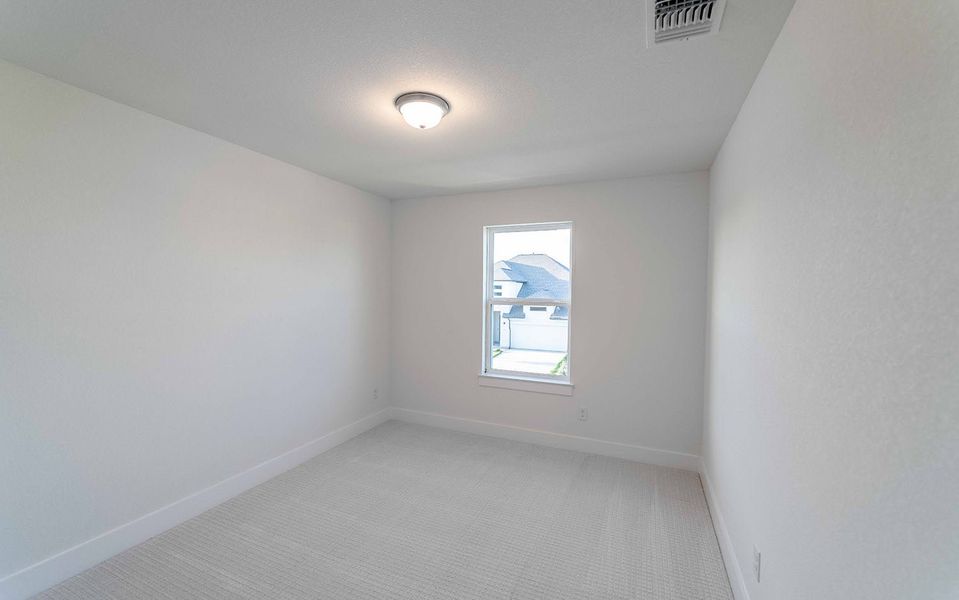 Spacious, unfurnished interior of a new home in Santa Rita Ranch, Liberty Hill (Image 36).