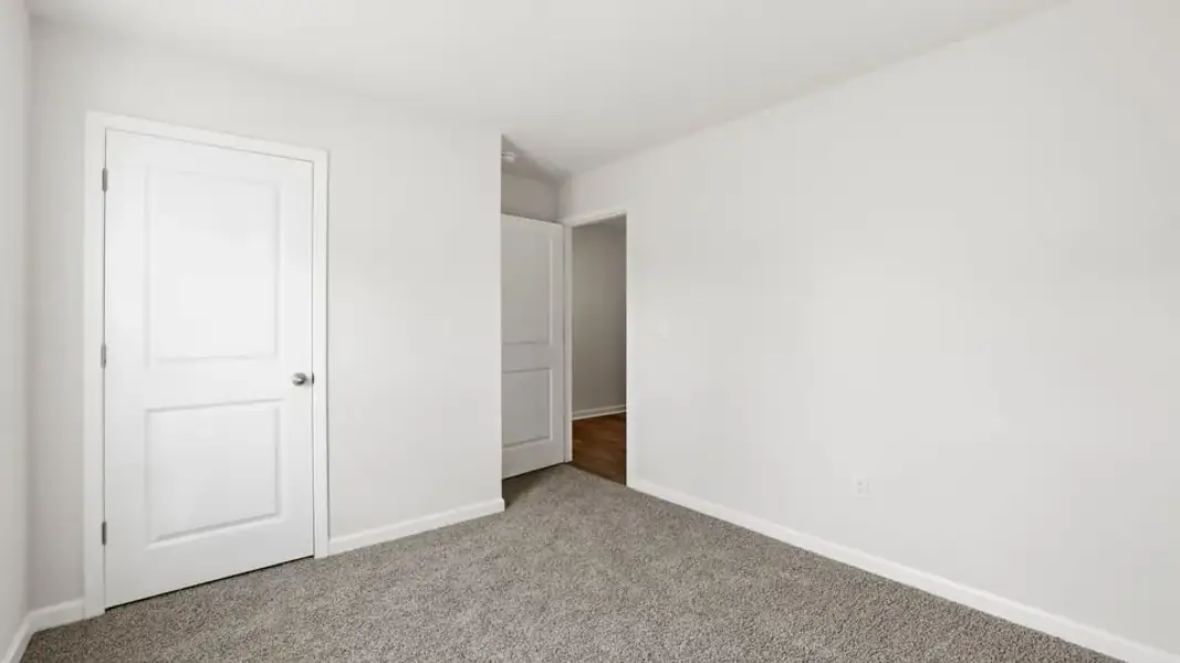 Spacious, unfurnished interior of a new home in Waverly Station, Greenwood (Image 19).