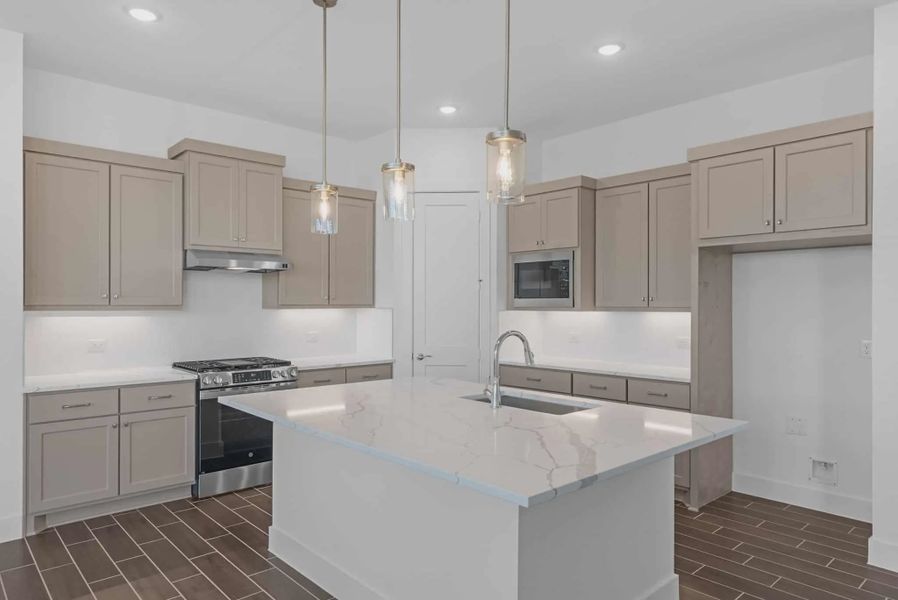 Representative furnished interior of a home built from the St Andrews by Chesmar Homes in Riceland Alley Loads, Mont Belvieu (Image 5).