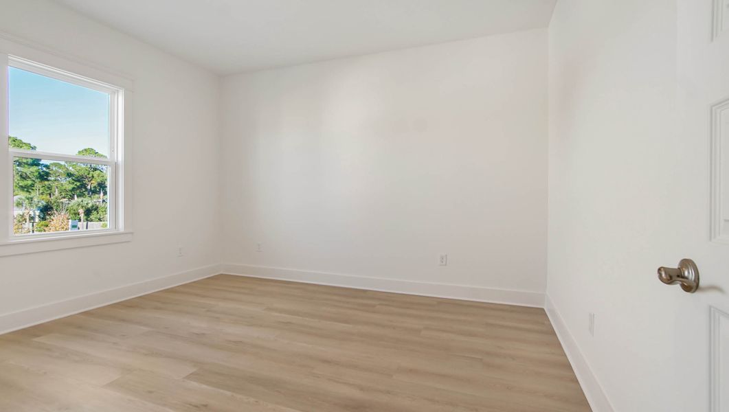 Representative unfurnished interior of a home built from the Ava by D.R. Horton in Parkside, Santa Rosa Beach (Image 40).