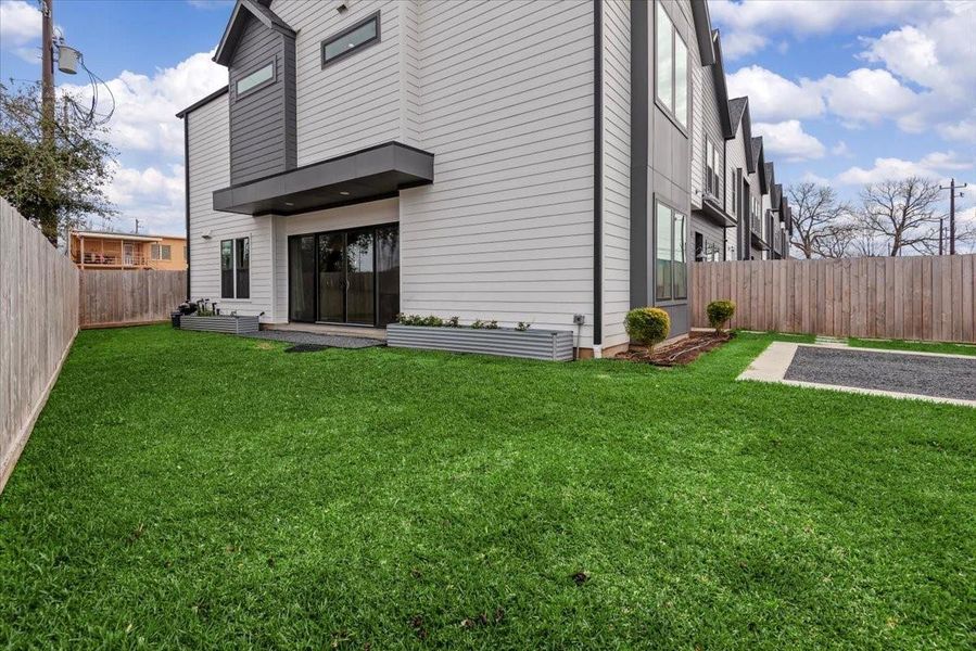 Exterior details and patio area of a home in Eleven at Eastwood, Houston (Image 2). Exterior details and patio area of a home in Eleven at Eastwood, Houston (Image 2).