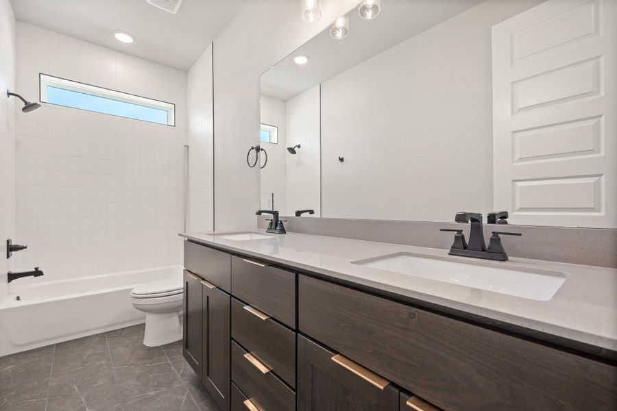 Furnished interior view inside a new home in Wolf Ranch, Georgetown (Image 16).
