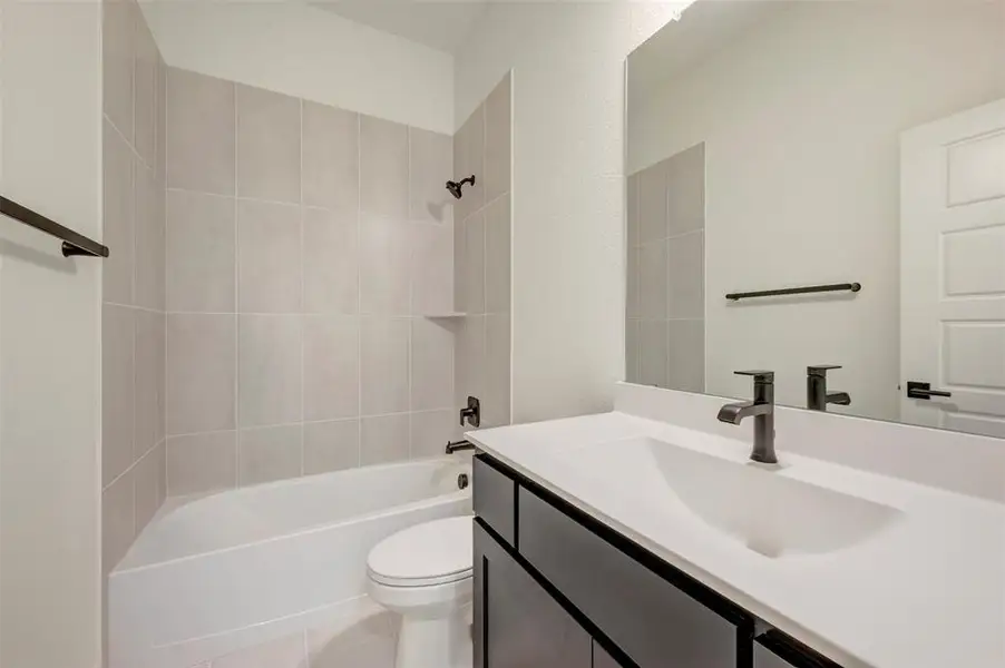 Furnished interior view inside a new home in Creekshaw – Classic, Royse City (Image 14).