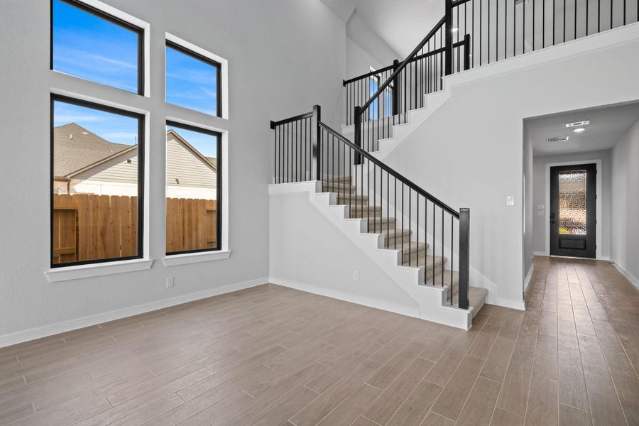 Beautiful windows allow natural light to aluminate through the home. Beautiful windows allow natural light to aluminate through the home.